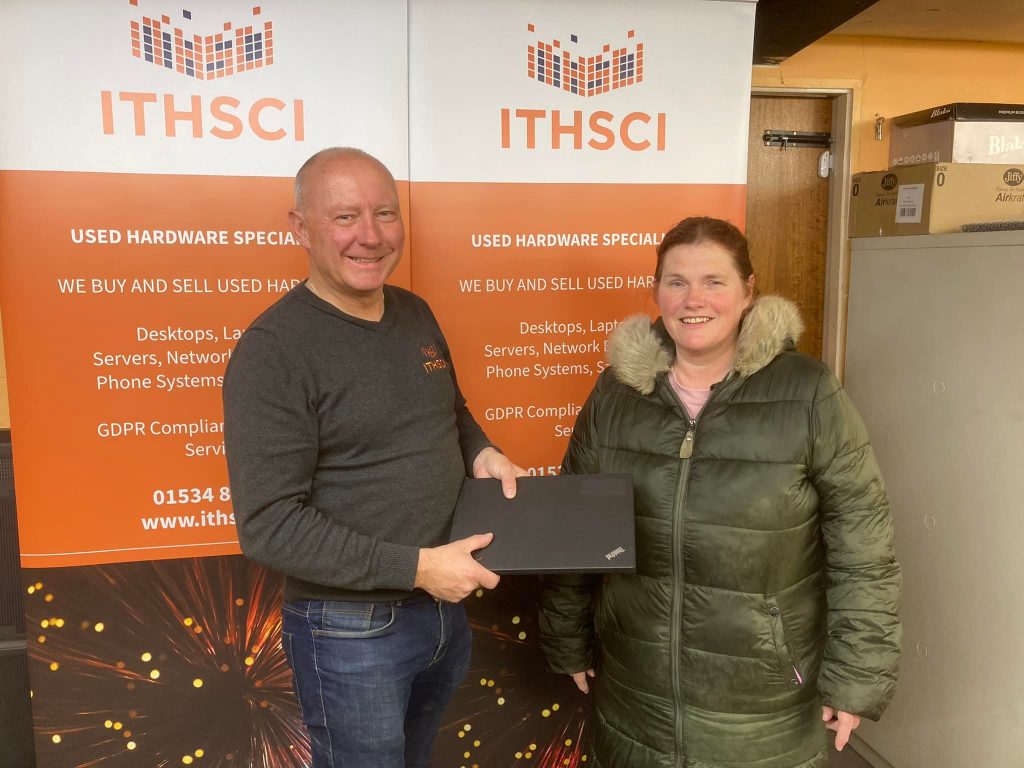 Laptop donated to school PTA volunteer for charitable work supporting local education.