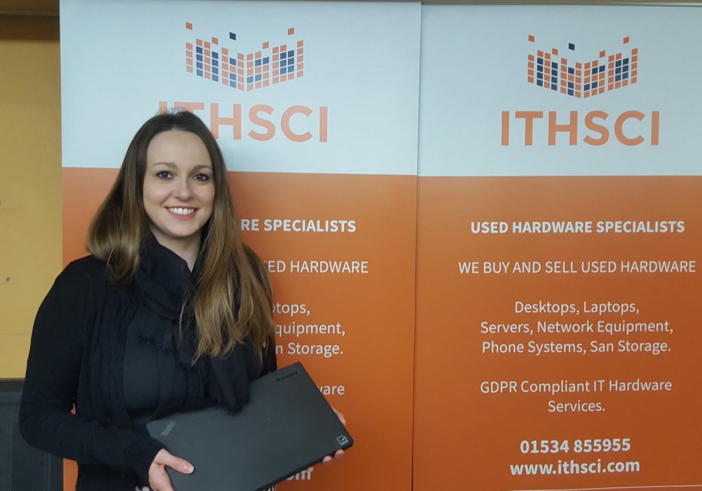 Sally Fox from Jersey Recovery College receiving a donated laptop
