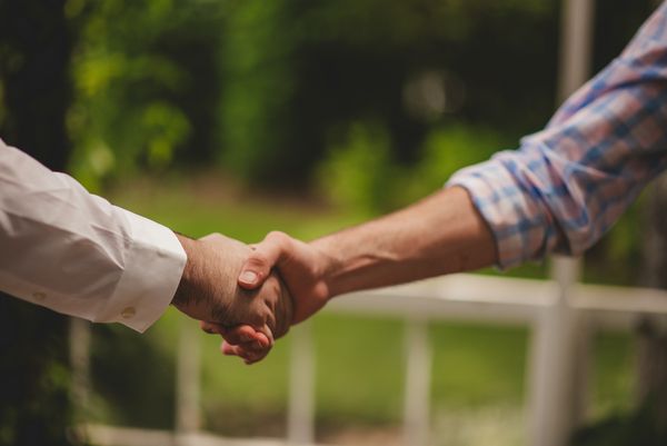 Two people shaking hands