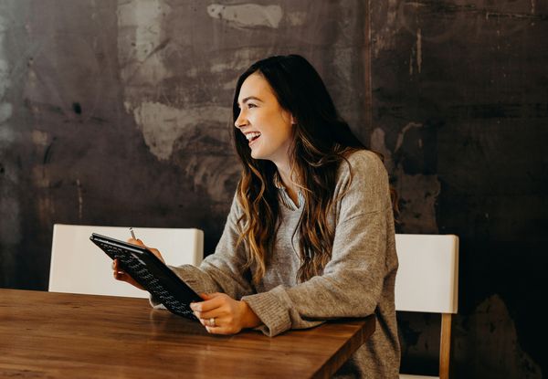 Happy woman in office setting
